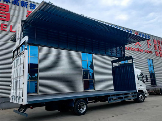 Wing opening box car