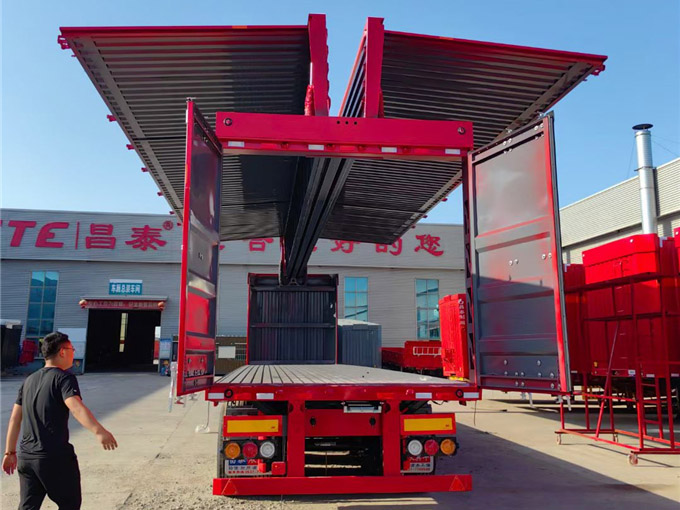 Wing opening box car